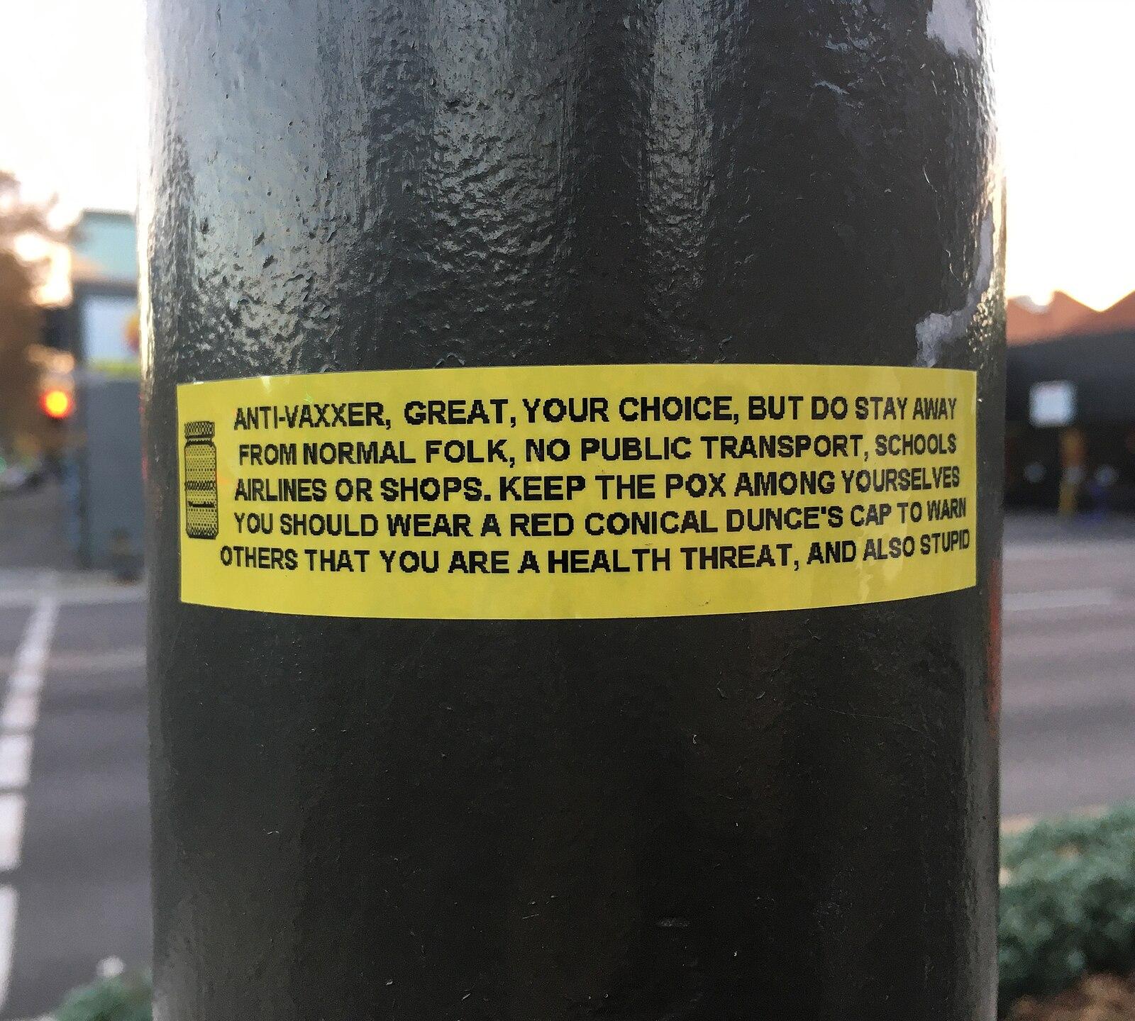 Anti anti vaxxer sticker on pole in Adelaide CBD